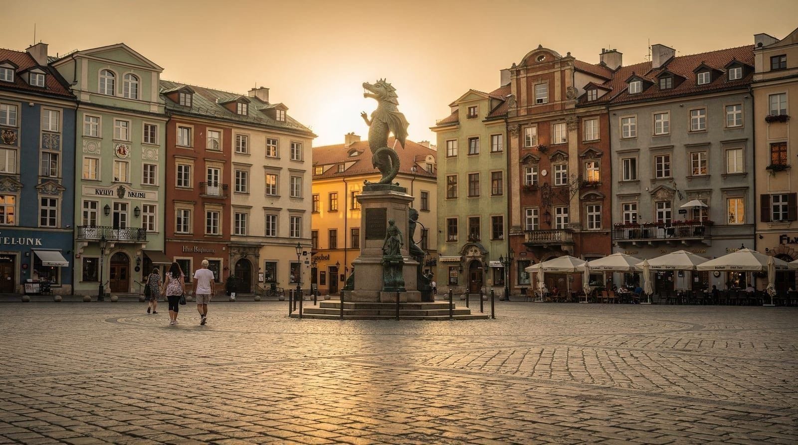 Warsaw Old Town market square at golden hour, Poland